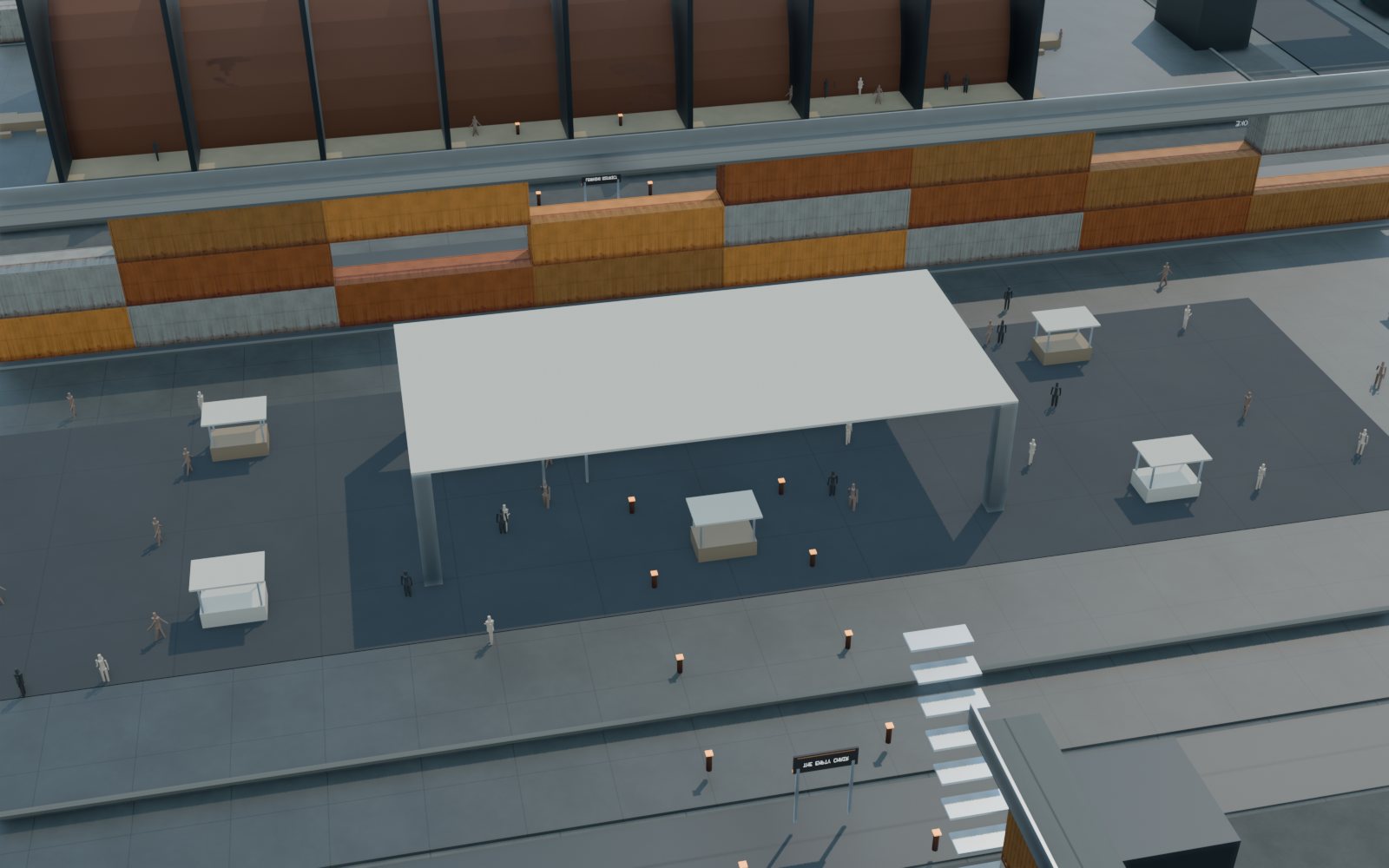 Harbor Market in daylight, rows of stalls with fabric roofs under a canopy inside a courtyard of stacked containers.